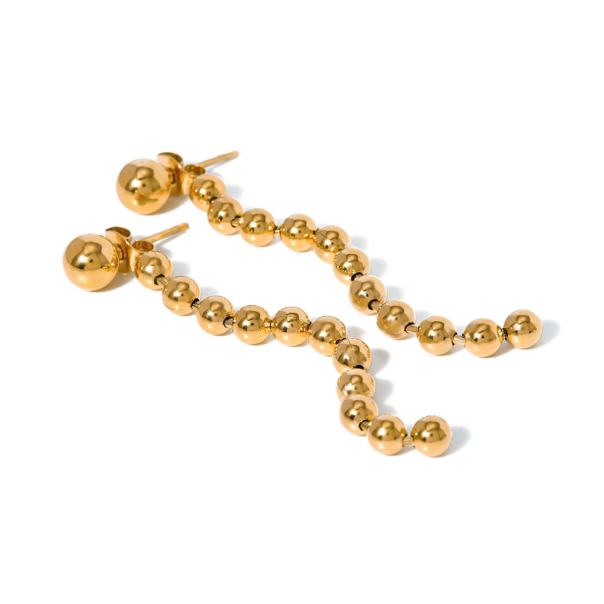 Gold stud with tail