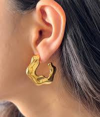 Sculpted gold earrings
